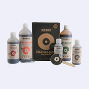 Biobizz Starterspack with organic growth nutrients for plants, including BIO-BLOOM, TOP-MAX, BIO-GROW, ROOT-JUIC, and BIO-HEAVY.